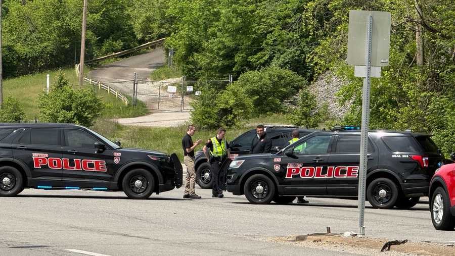 Police block a road near a chemical plant where a leak occurred Wednesday, April 22, 2026, in Institute, W.Va. (AP Photo/John Raby)