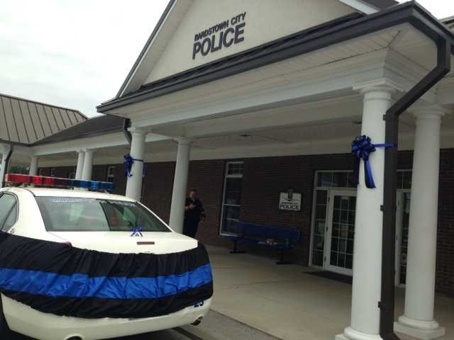 May 26, 2013: Throughout Sunday, people stopped by the Bardstown Police Department to pay their respects. 
