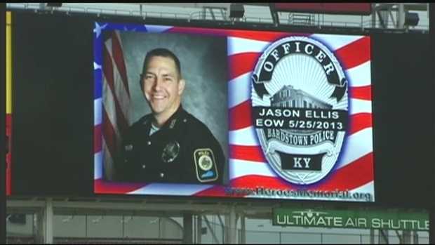 June 18, 2013: Officer Jason Ellis' family was on hand at Great American Ball Park Tuesday night as part of Police Officer Appreciation Day.