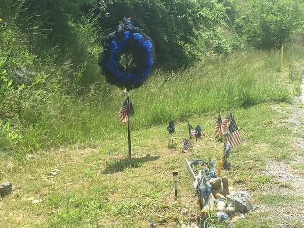 May 25, 2016: A memorial sits along the exit ramp where Jason Ellis was killed.