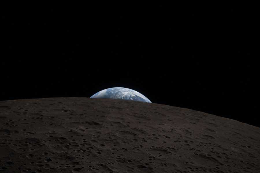 This photo from the Artemis II lunar flyby shows the Earth "setting" behind the moon.