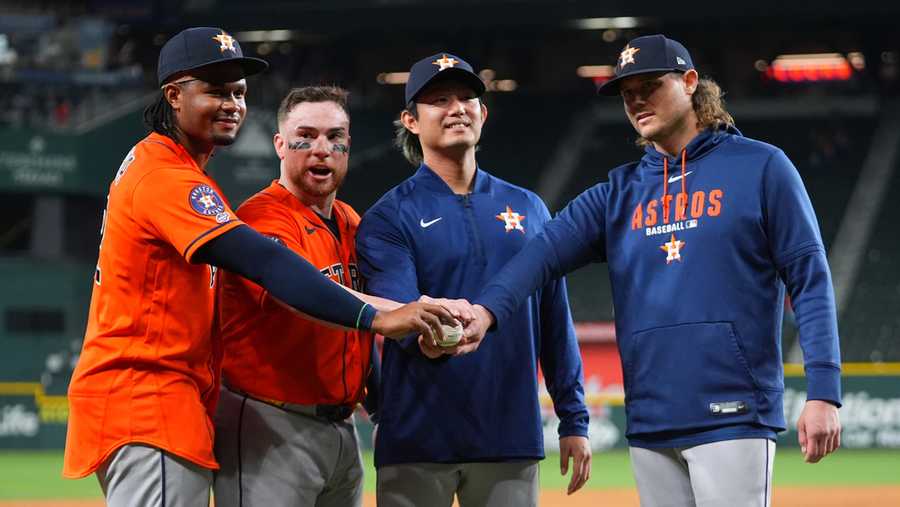 Houston Astros pitchers Alimber Santa, left, Houston Astros starting pitcher Tatsuya Imai throws to the Texas Rangers, center right, and Steven Okert, right, pose with catcher Christian V·zquez after combining for a no-hitter against the Texas Rangers during a baseball game Monday, May 25, 2026, in Arlington, Texas.