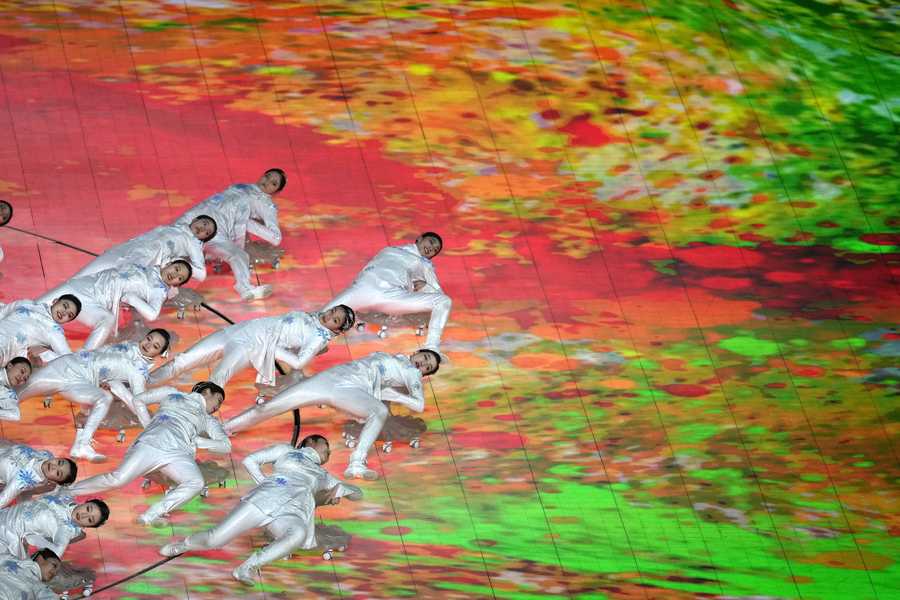 Participants perform during the opening ceremony at the 2022 Winter Paralympics, Friday, March 4, 2022, in Beijing.