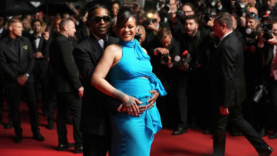 FILE - A$AP Rocky, left, and Rihanna pose for photographers upon departure from the premiere of the film &apos;Highest 2 Lowest&apos; at the 78th international film festival, Cannes, southern France, Monday, May 19, 2025. (Photo by Lewis Joly/Invision/AP, File)