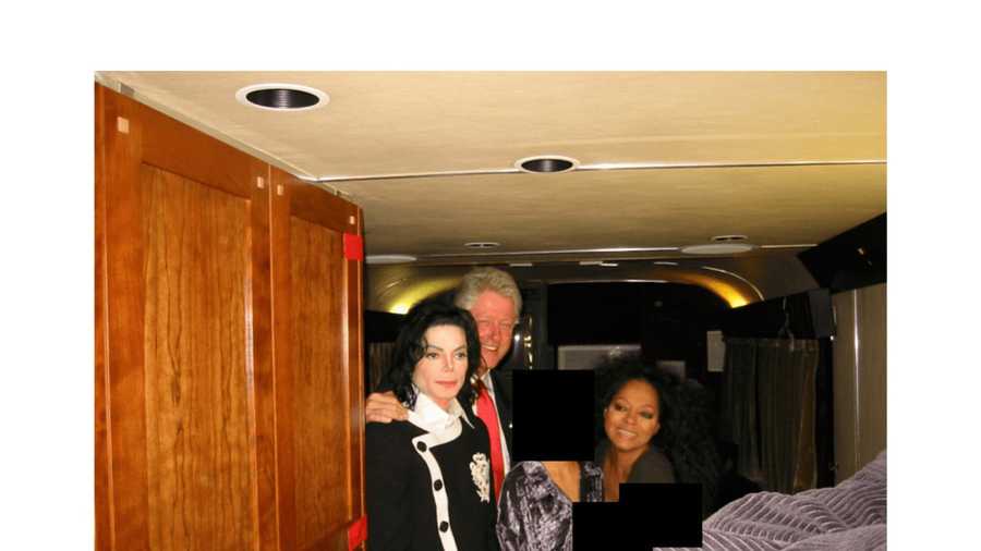 This undated, redacted photo released by the U.S. Department of Justice shows Michael Jackson, former President Bill Clinton and Diana Ross with an unknown person. (U.S. Department of Justice via AP)