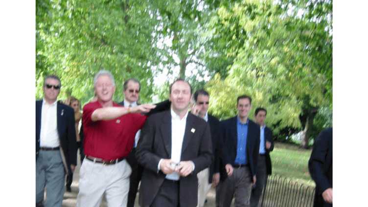 This undated photo released by the U.S. Department of Justice shows former President Bill Clinton, in red, with actor Kevin Spacey, center. (U.S. Department of Justice via AP)