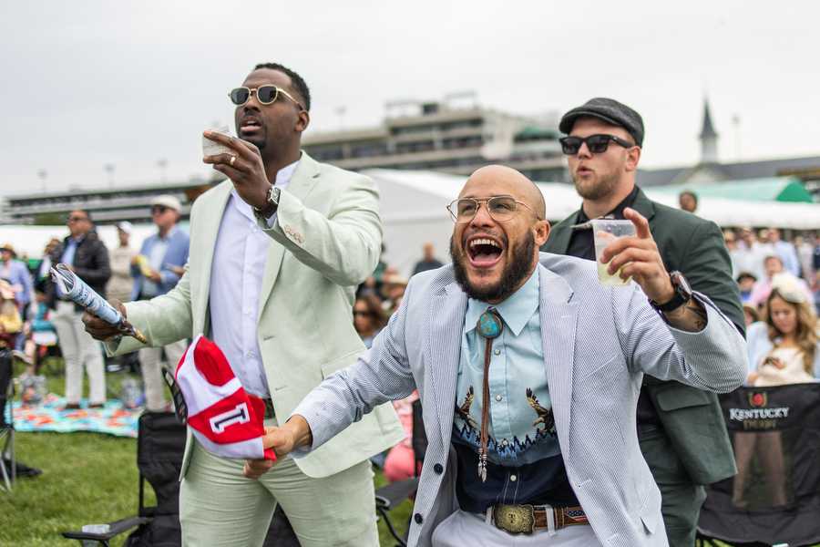 Attendees cheer during a prep race prior to the 152nd running of the Kentucky Derby at Churchill Downs in Louisville, Kentucky, on May 2, 2026. (Photo by Leandro Lozada / AFP via Getty Images)
