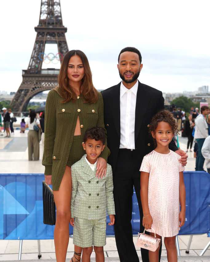 PARIS, FRANCE - JULY 26: Chrissy Teigen and John Legend attend with son Miles and daughter Luna the red carpet ahead of the opening ceremony of the Olympic Games Paris 2024 on July 26, 2024 in Paris, France. (Photo by Matthew Stockman/Getty Images)
