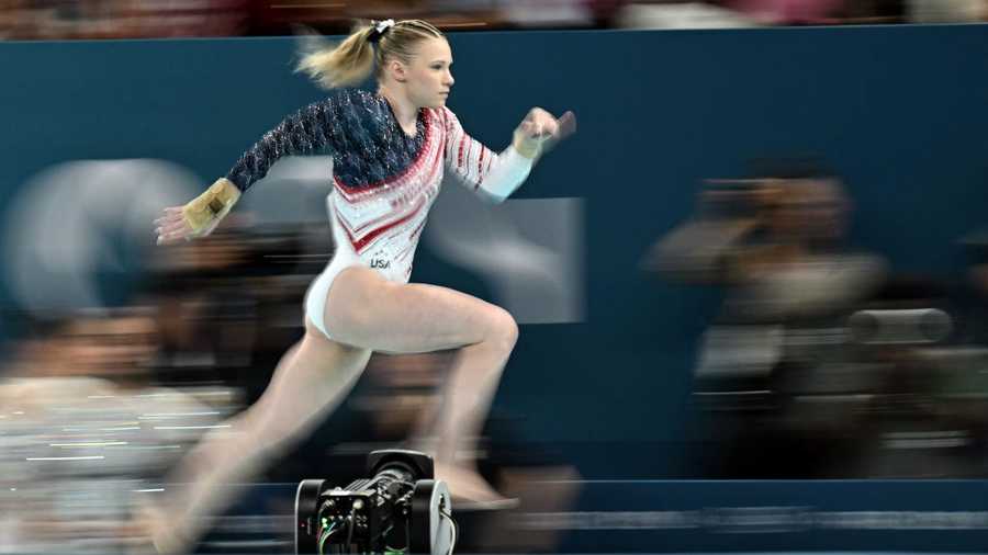US&apos; Jade Carey competes in the floor exercise event of the artistic gymnastics women&apos;s team final during the Paris 2024 Olympic Games at the Bercy Arena in Paris, on July 30, 2024. (Photo by Lionel BONAVENTURE / AFP) (Photo by LIONEL BONAVENTURE/AFP via Getty Images)