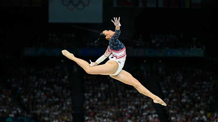 US&apos; Sunisa Lee competes in the balance beam event of the artistic gymnastics women&apos;s team final during the Paris 2024 Olympic Games at the Bercy Arena in Paris, on July 30, 2024. (Photo by Gabriel BOUYS / AFP) (Photo by GABRIEL BOUYS/AFP via Getty Images)