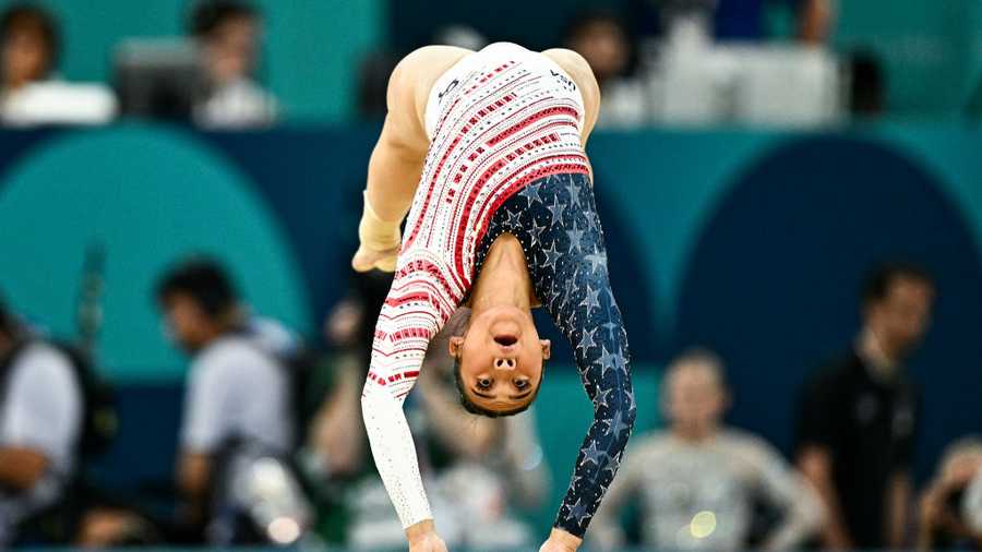 US&apos; Sunisa Lee competes in the floor exercise event of the artistic gymnastics women&apos;s team final during the Paris 2024 Olympic Games at the Bercy Arena in Paris, on July 30, 2024. (Photo by Gabriel BOUYS / AFP) (Photo by GABRIEL BOUYS/AFP via Getty Images)