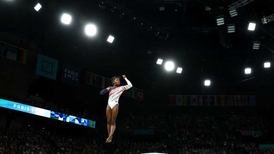 PARIS, FRANCE - JULY 30: Simone Biles of Team United States competes on the vault during the Artistic Gymnastics Women&apos;s Team Final on day four of the Olympic Games Paris 2024 at Bercy Arena on July 30, 2024 in Paris, France. (Photo by Naomi Baker/Getty Images)