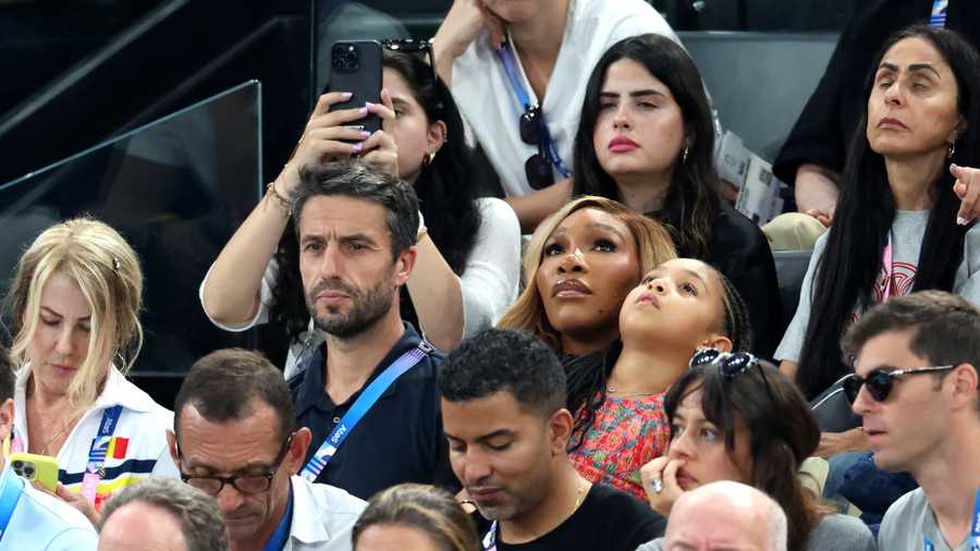 PARIS, FRANCE - JULY 30: President of Paris 2024 Tony Estanguet (C) and Serena Williams (R) are seen during the Artistic Gymnastics Women&apos;s Team Final on day four of the Olympic Games Paris 2024 at Bercy Arena on July 30, 2024 in Paris, France. (Photo by Pascal Le Segretain/Getty Images)