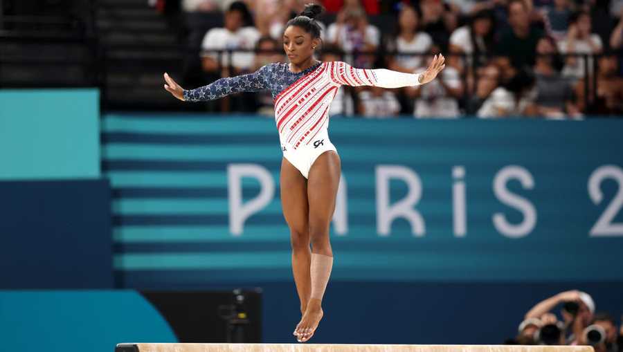 PARIS, FRANCE - JULY 30: Simone Biles of Team United States in action on the balance beam during the Artistic Gymnastics Women&apos;s Team Final on day four of the Olympic Games Paris 2024 at Bercy Arena on July 30, 2024 in Paris, France. (Photo by Jamie Squire/Getty Images)