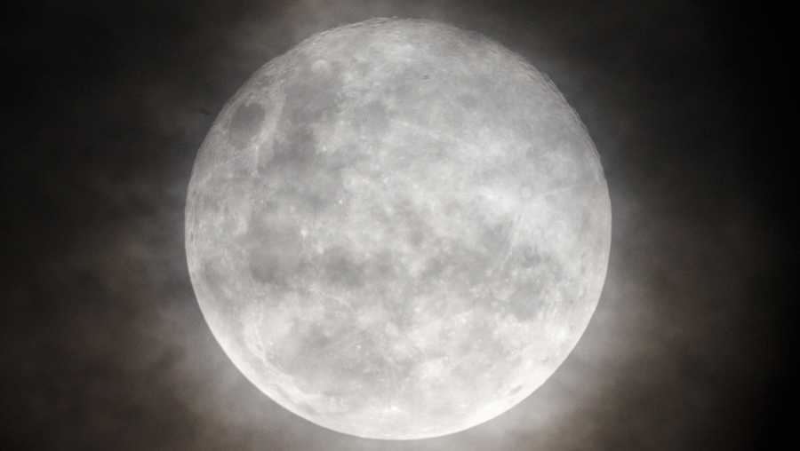 The last supermoon of the year 2025, known as the Cold Moon, rises over Bekasi City, West Java Province, Indonesia, on December 5, 2025. (Photo by Aditya Irawan/NurPhoto via Getty Images)