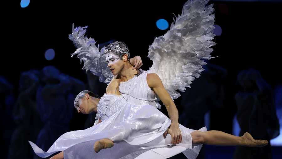 Cupid (Claudio Coviello) and Psyche (Antonella Albano) perform a tribute to Italian beauty during the opening ceremony of the Milano Cortina 2026 Winter Olympics at San Siro Stadium on February 06, 2026 in Milan, Italy.