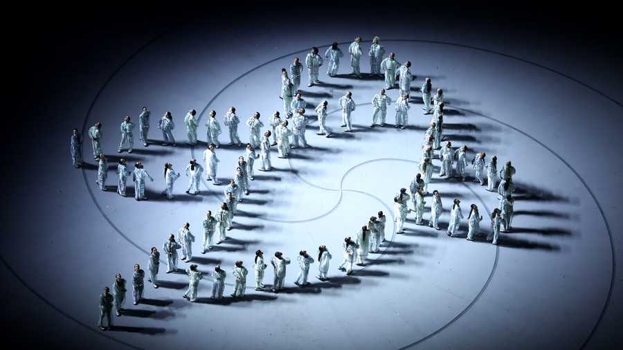 Ghali performs Promemoria (Memorandum) by Gianni Rodari during the opening ceremony of the Milano Cortina 2026 Winter Olympics at San Siro Stadium.