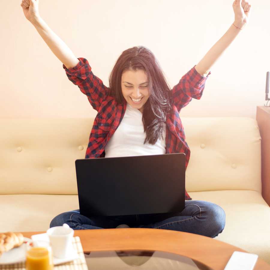 Happy woman with laptop