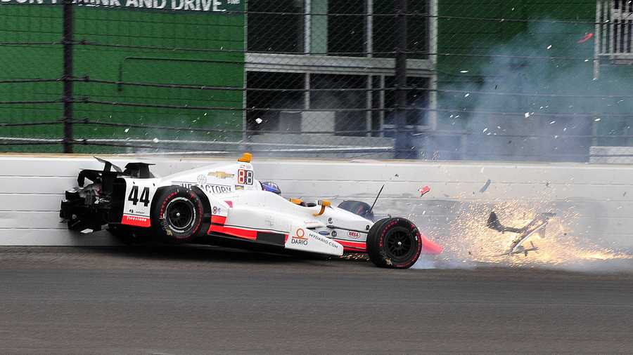 The car driven by Buddy Lazier hits the wall in the second turn during the running of the Indianapolis 500 auto race at Indianapolis Motor Speedway, Sunday, May 28, 2017, in Indianapolis. (AP Photo/John Maxwell) 