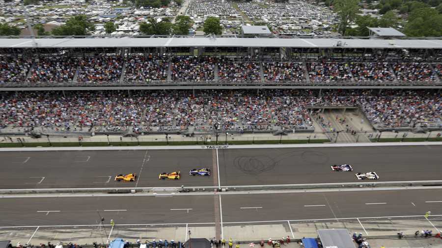 Fans fill the stands in the main straightaway during the running of the Indianapolis 500 auto race at Indianapolis Motor Speedway, Sunday, May 28, 2017, in Indianapolis. (AP Photo/Darron Cummings)
