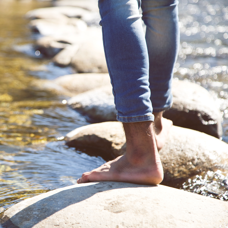 Water, Leg, Human leg, Footwear, Jeans, Reflection, Shoe, Hand, Human body, Foot, 