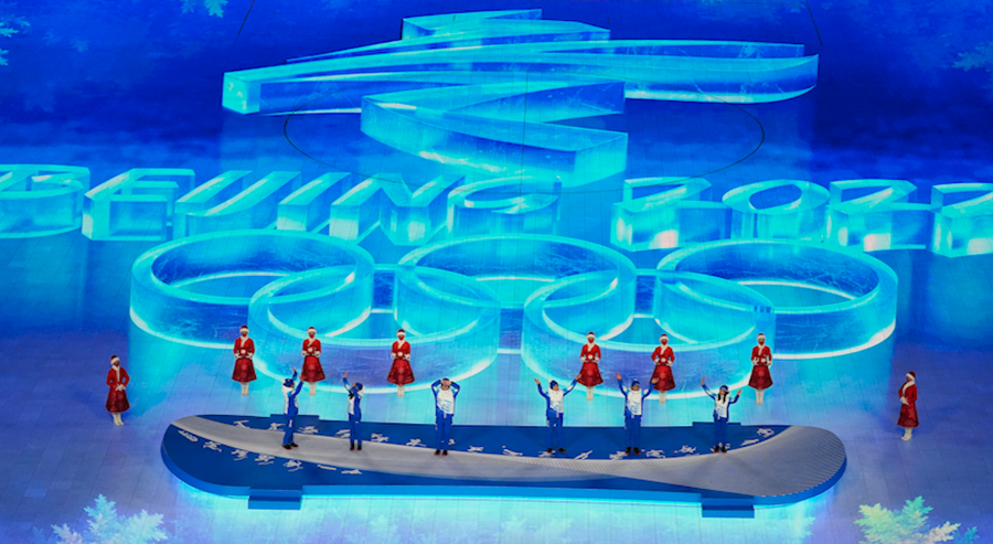 Volunteers are honored during the closing ceremony of the 2022 Winter Olympics, Sunday, Feb. 20, 2022, in Beijing.